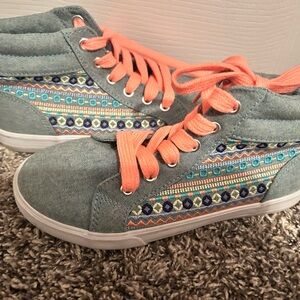 Colorful High-Top Sneakers with Orange Laces